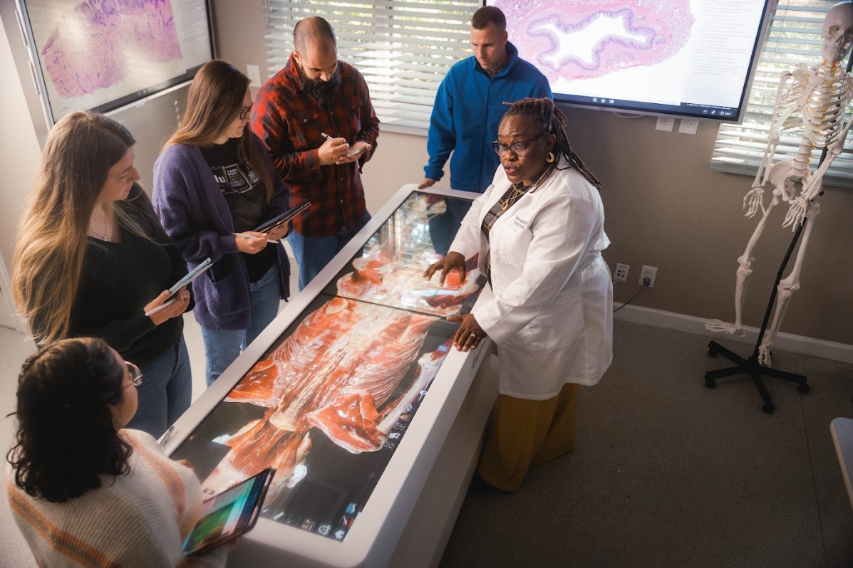 instructor showcasing a pathology table